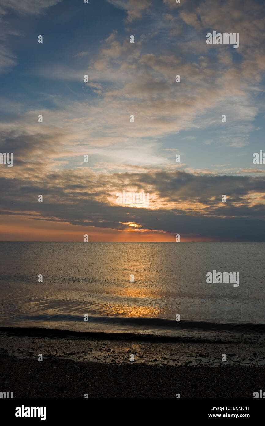 Sunset Reflections over the sea Stock Photo - Alamy