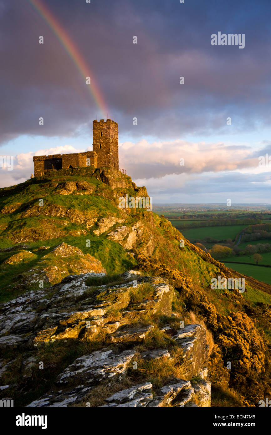 Rainbow above Brentor Church Dartmoor National Park Devon England Spring April 2009 Stock Photo