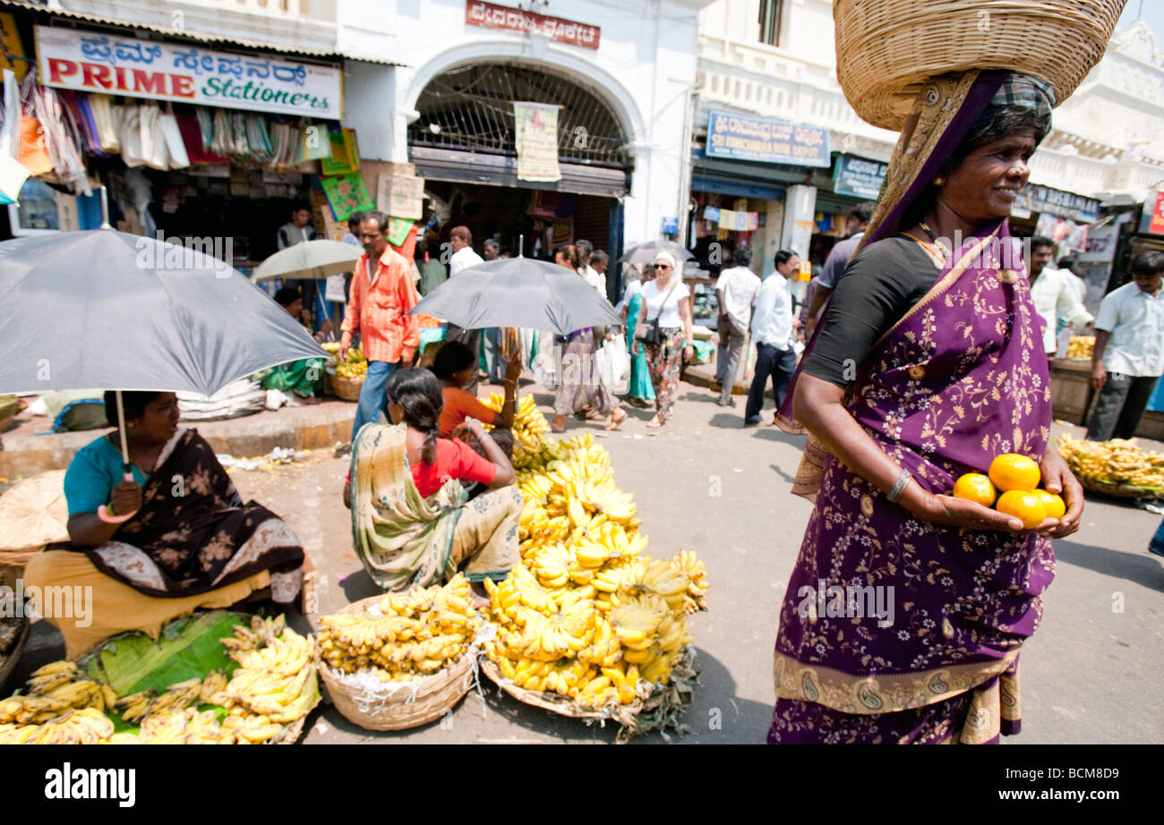 Indian woman selling fresh orange hires stock photography and images