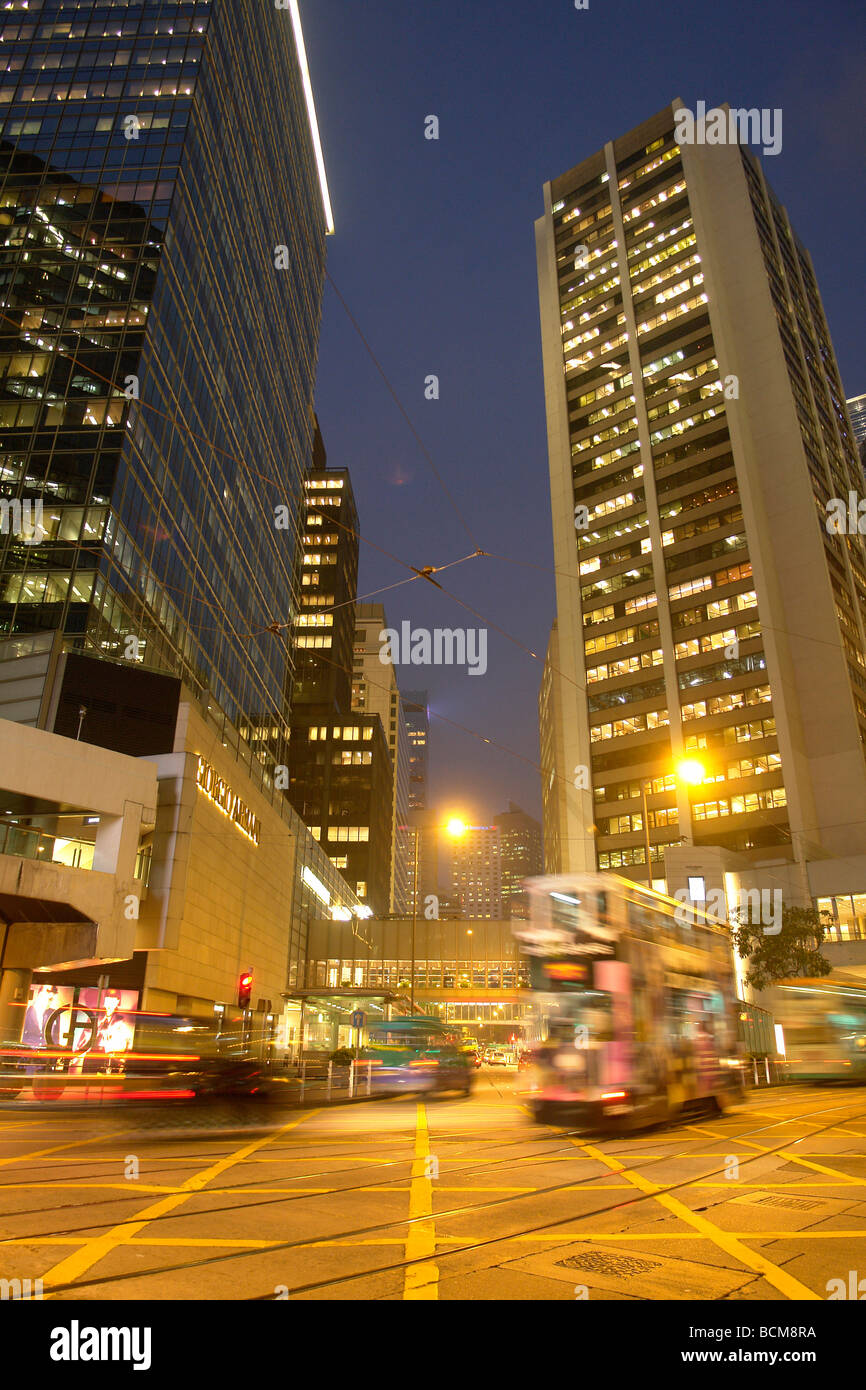 China Hong Kong traffic intersection at dusk in central district Stock Photo