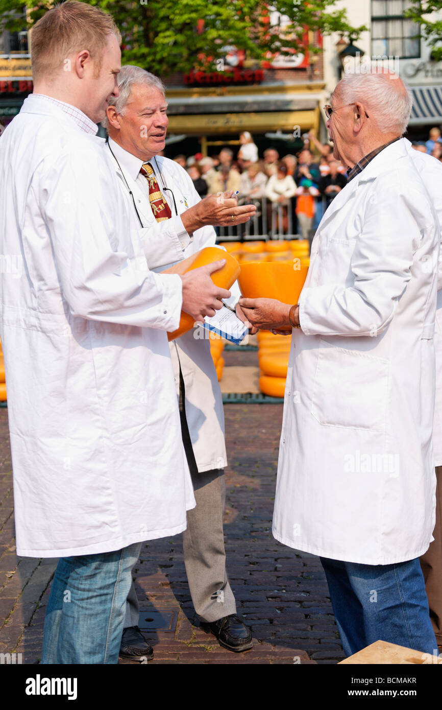 Cheese inspectors at the Alkmaar Cheesemarket, Alkmaar, North Holland, Netherlands. Stock Photo