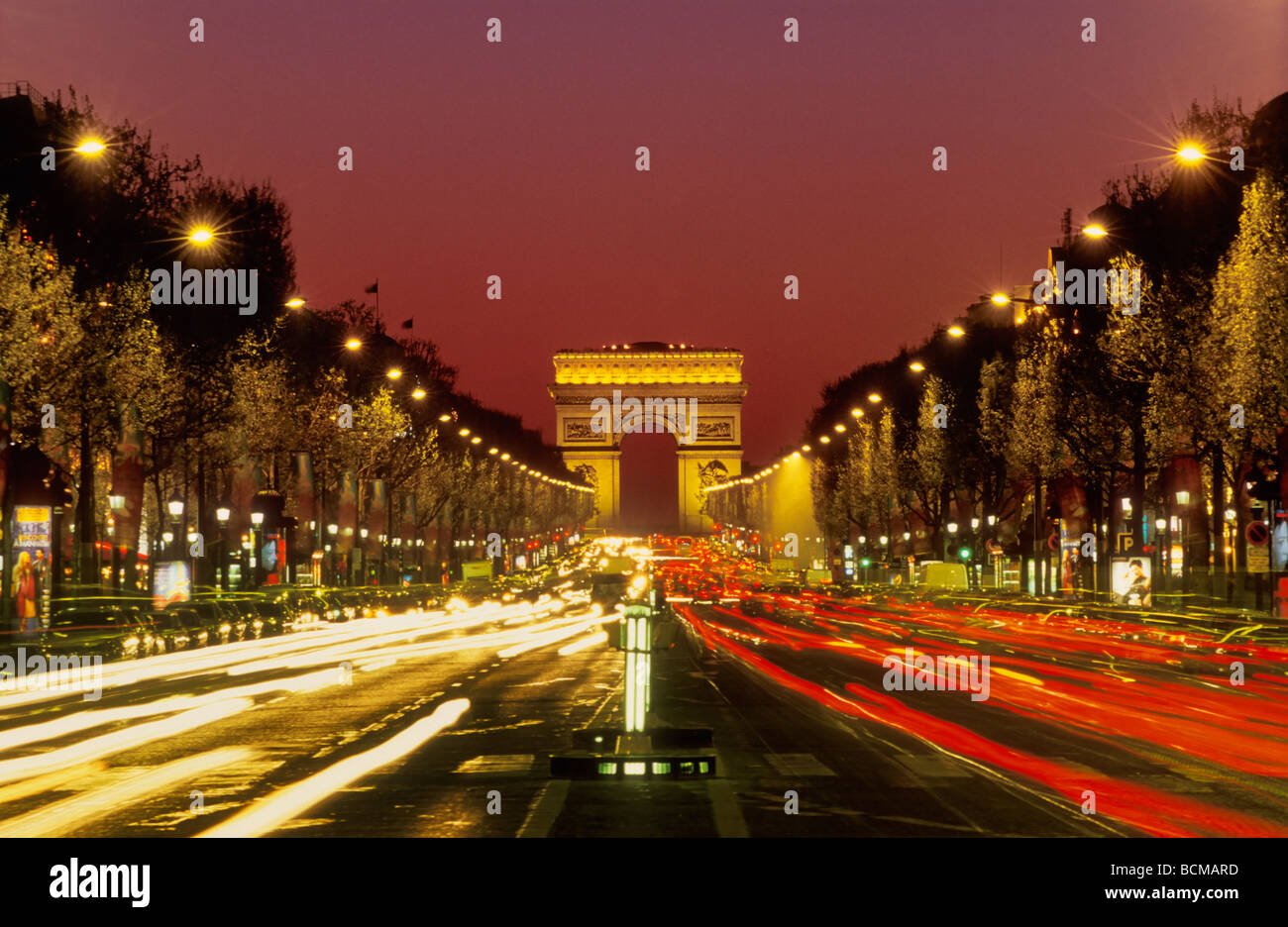 Champs Elysees traffic light trails at night Paris France EU Europe Stock Photo