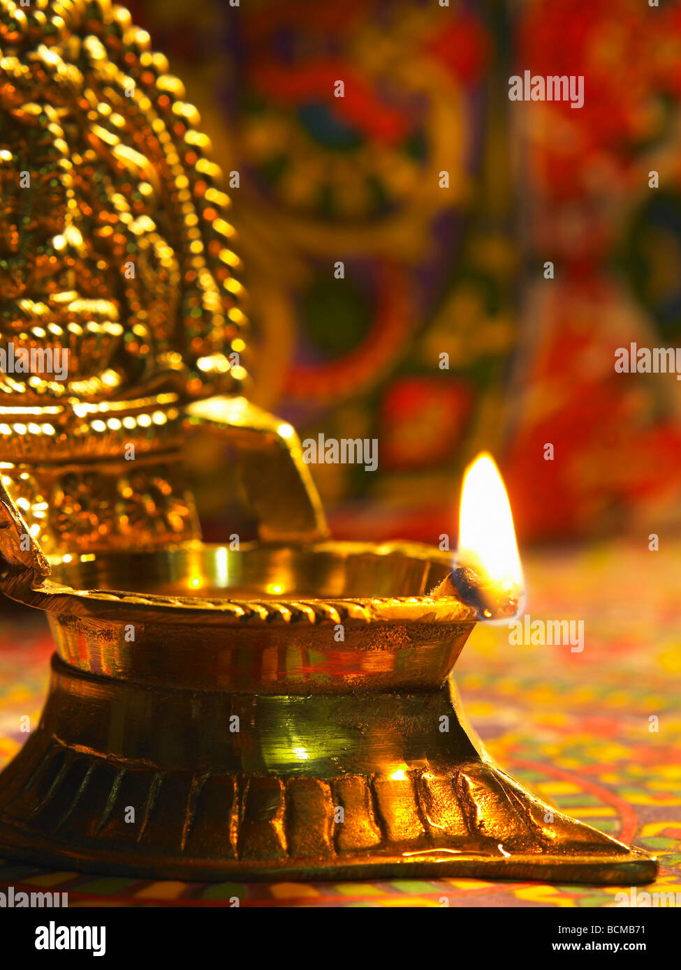 traditional indian oil lamp burning during deepavali Stock Photo Alamy
