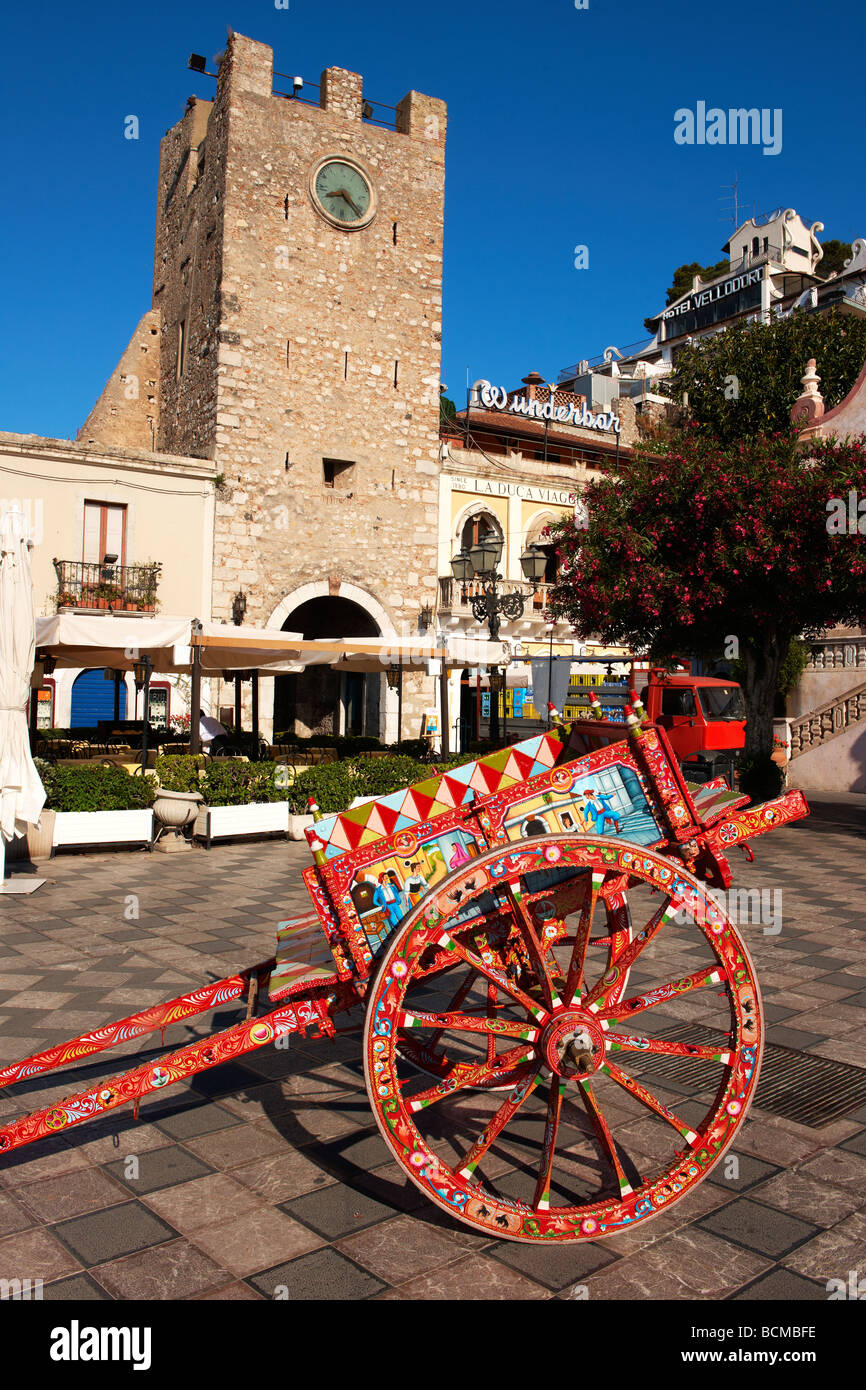 Traditional Sicilian folk art on a wooden cart depicting folk tales of Sicily - Taormina, Sicily Stock Photo