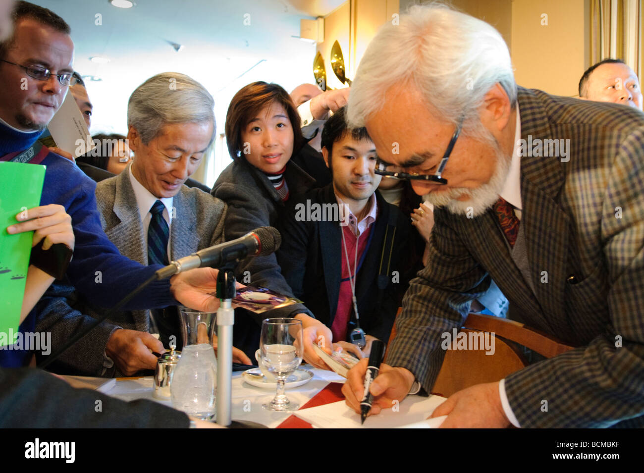 Anime director Hayao Miyazaki signing autographs in Tokyo, Japan, 20 November 2008. Stock Photo