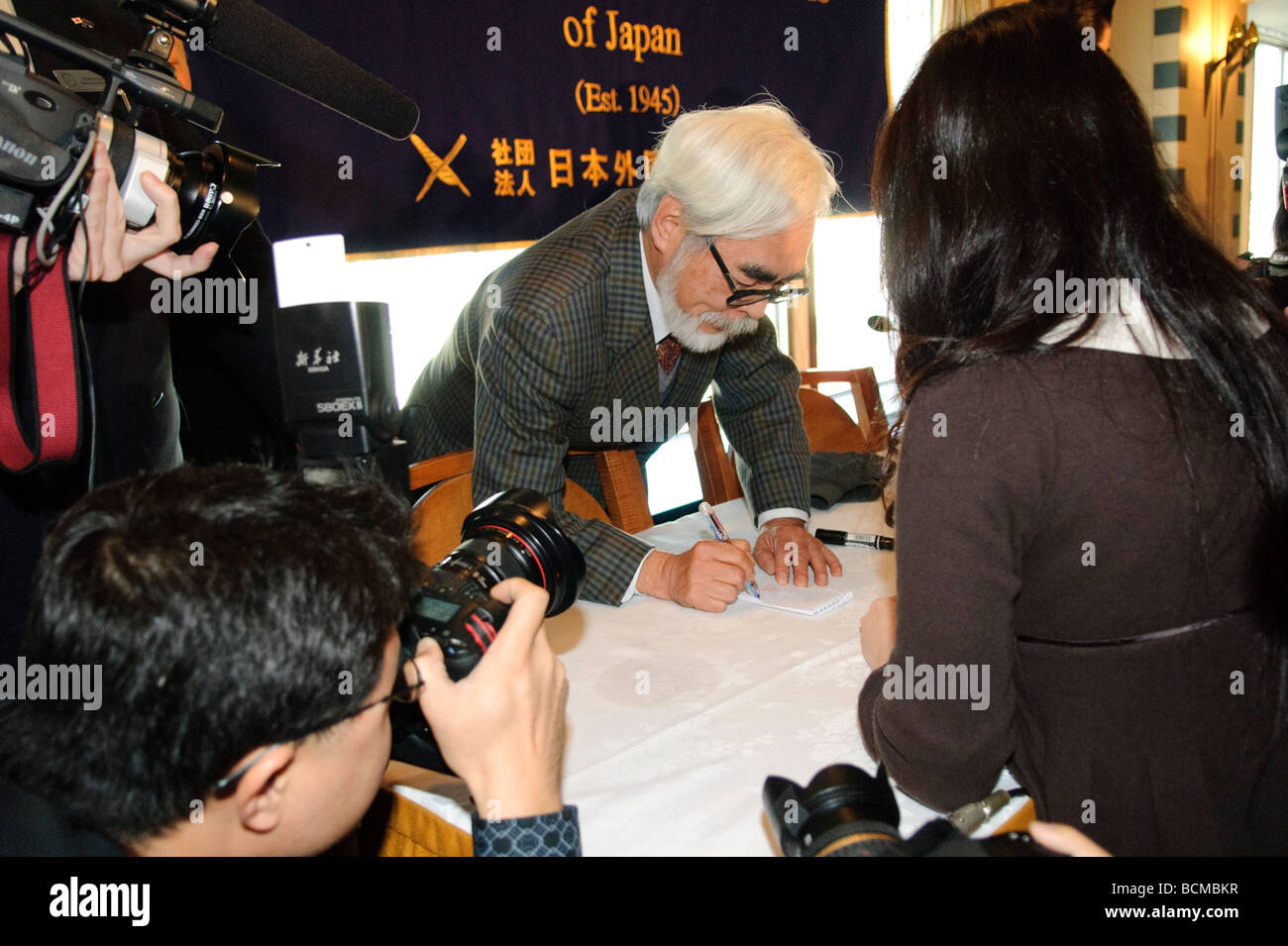 Anime director Hayao Miyazaki signing autographs in Tokyo, Japan, 20 November 2008. Stock Photo