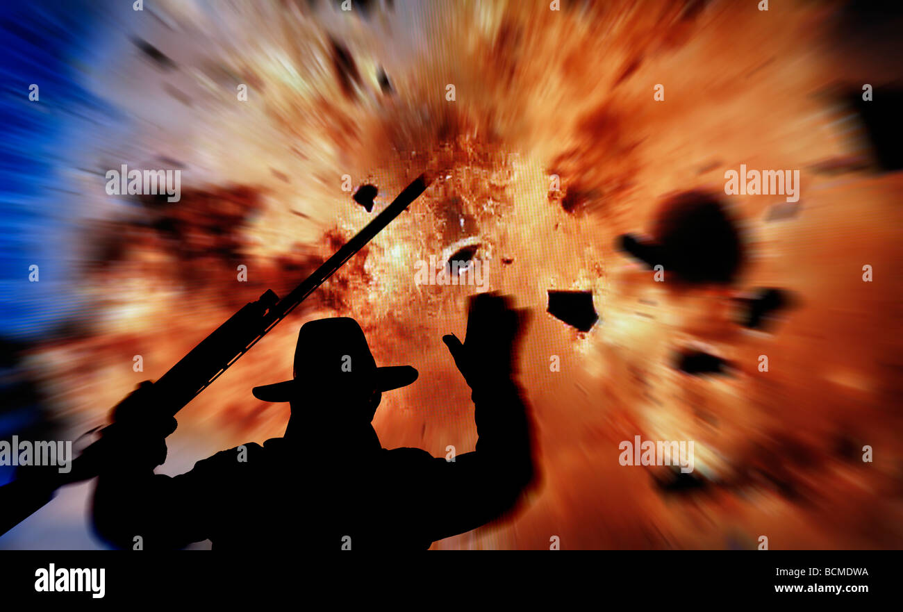 silhouette of man with gun running from huge explosion Stock Photo