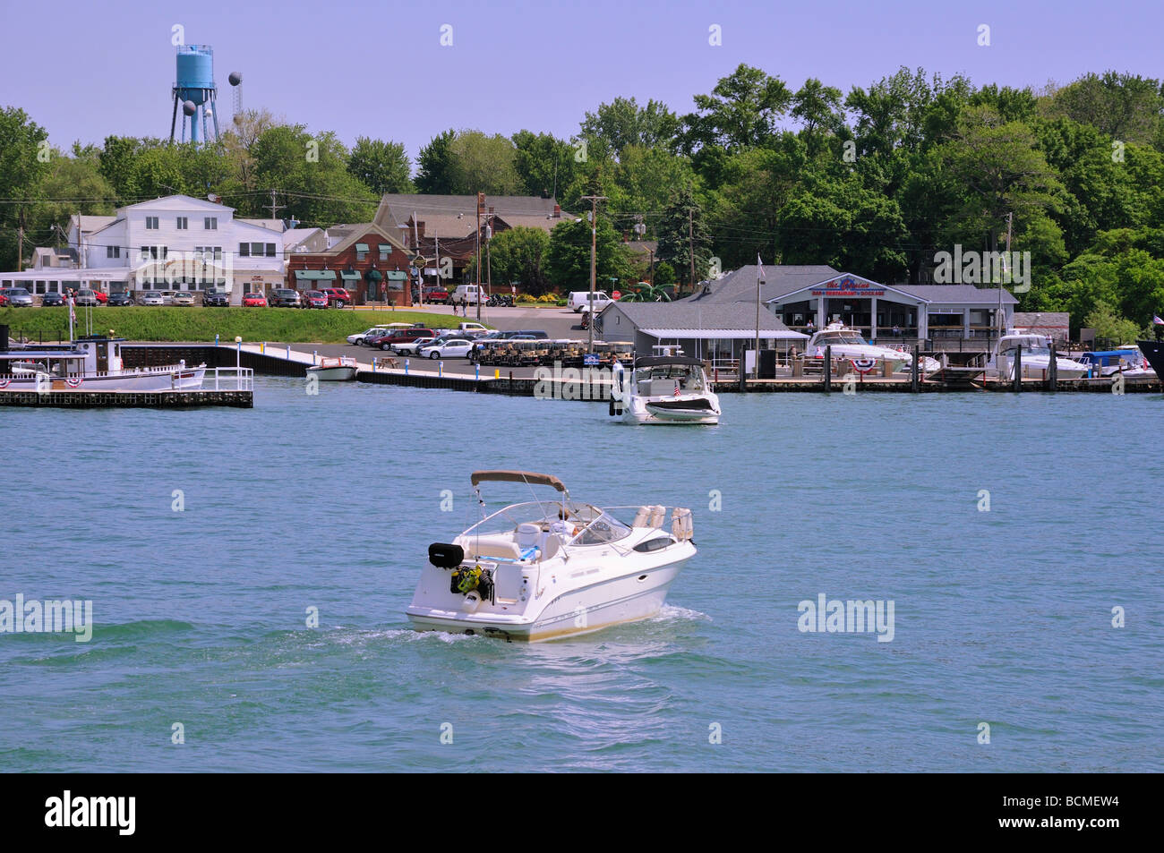 A boat streams toward the marina on Kelleys Island Stock Photo Alamy