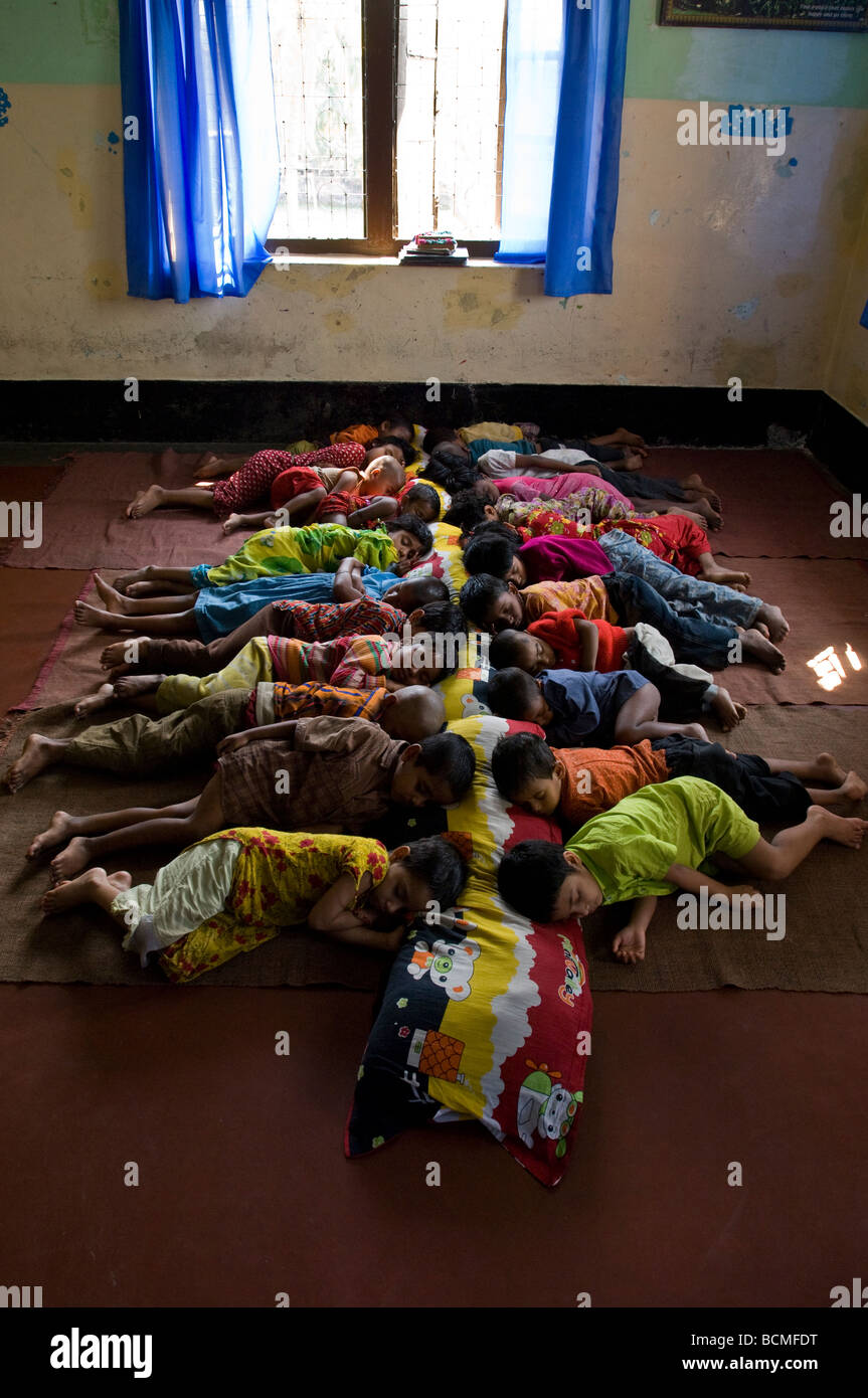 Children Sleeping On Floor Of Shelter Jamalpur Bangladesh Stock