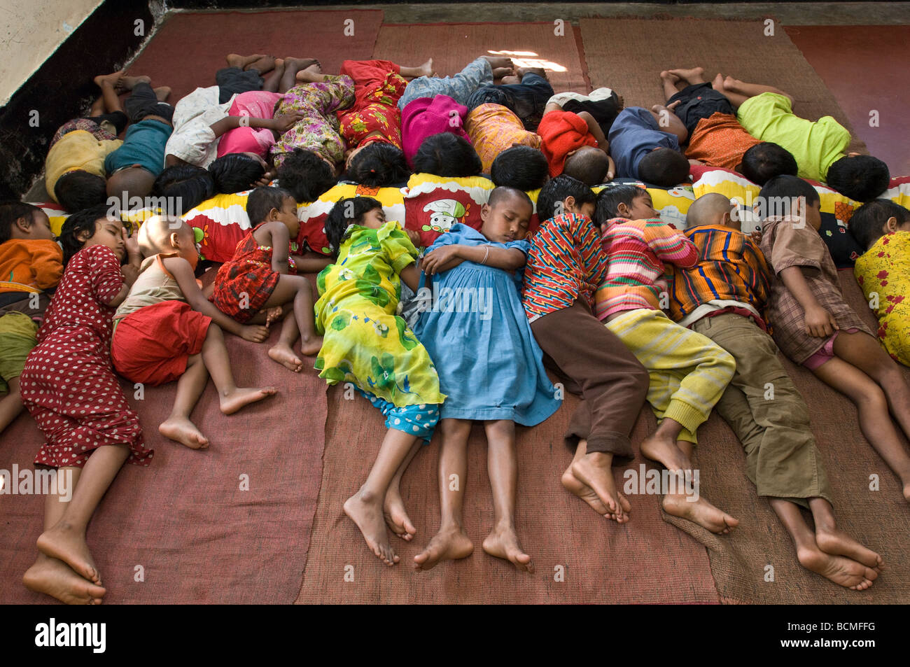 Children Sleeping On Floor Of Shelter Jamalpur Bangladesh Stock