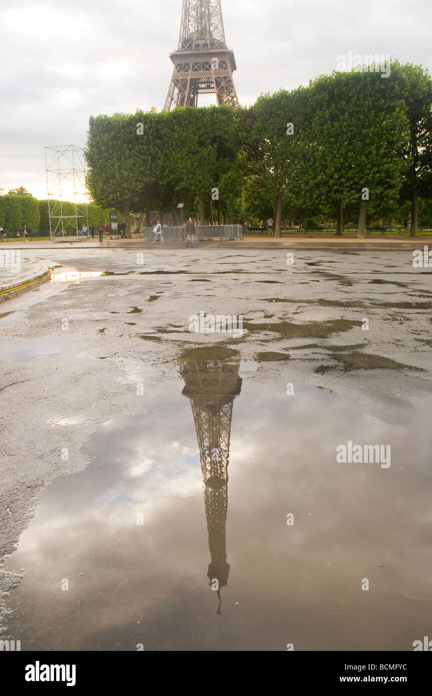 View of the Eiffel Tower reflected on the floor after a rain. Stock Photo
