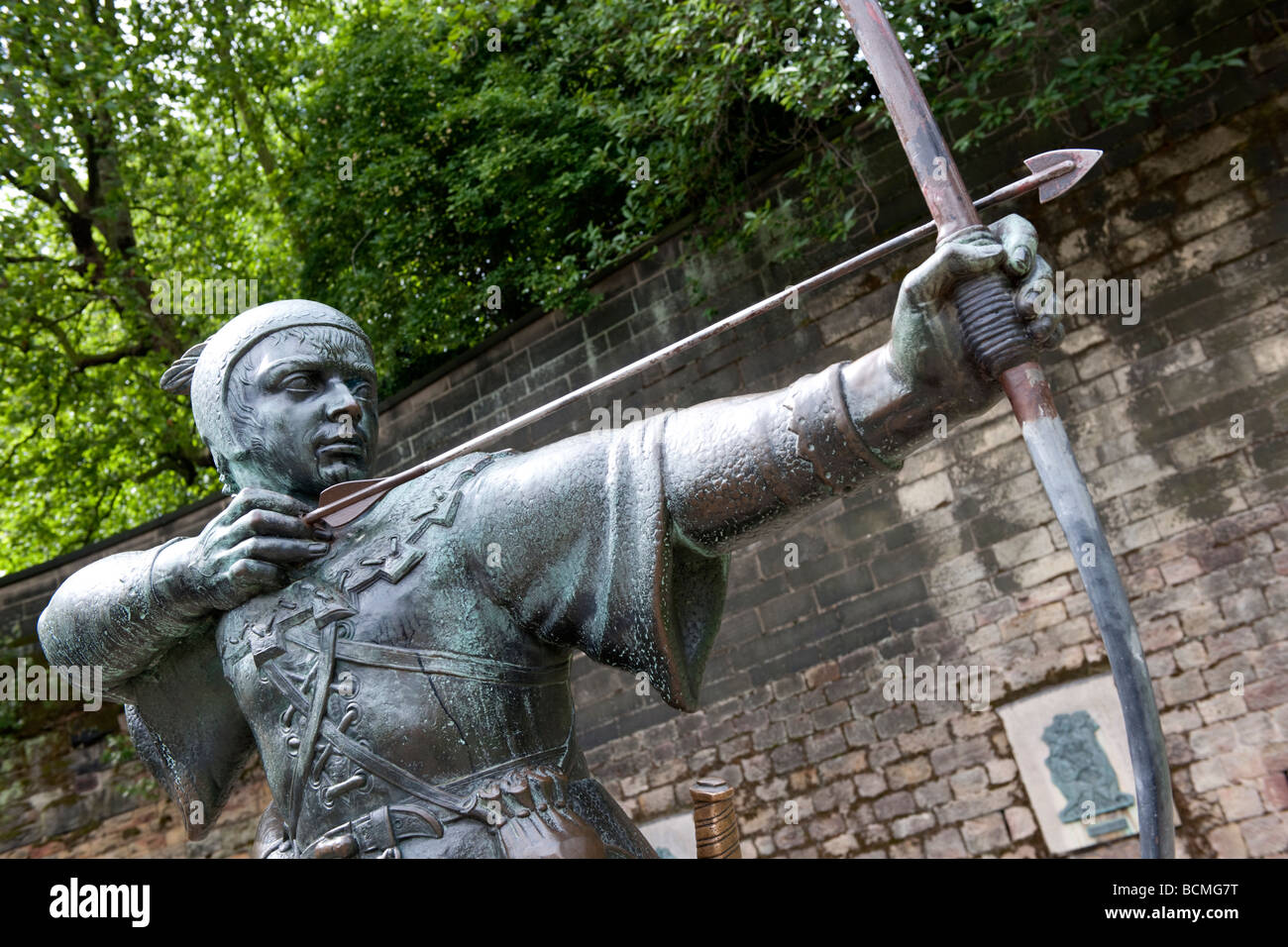 Statue of Robin Hood standing outside Nottingham Castle Museum in Nottingham England Stock Photo