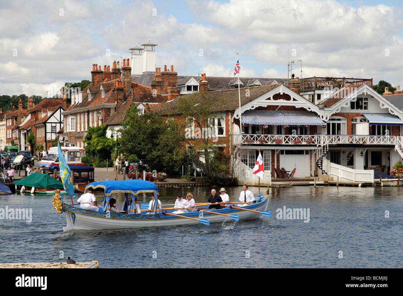 Henley on Thames the Royal Thamesis replica royal barge and crew rowing