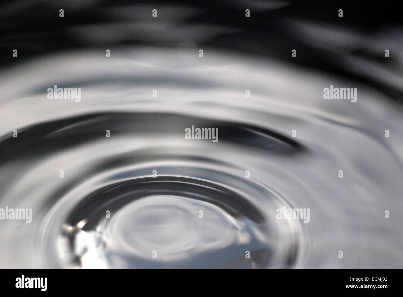 Macro close up of water splash that looks like oil Stock Photo - Alamy