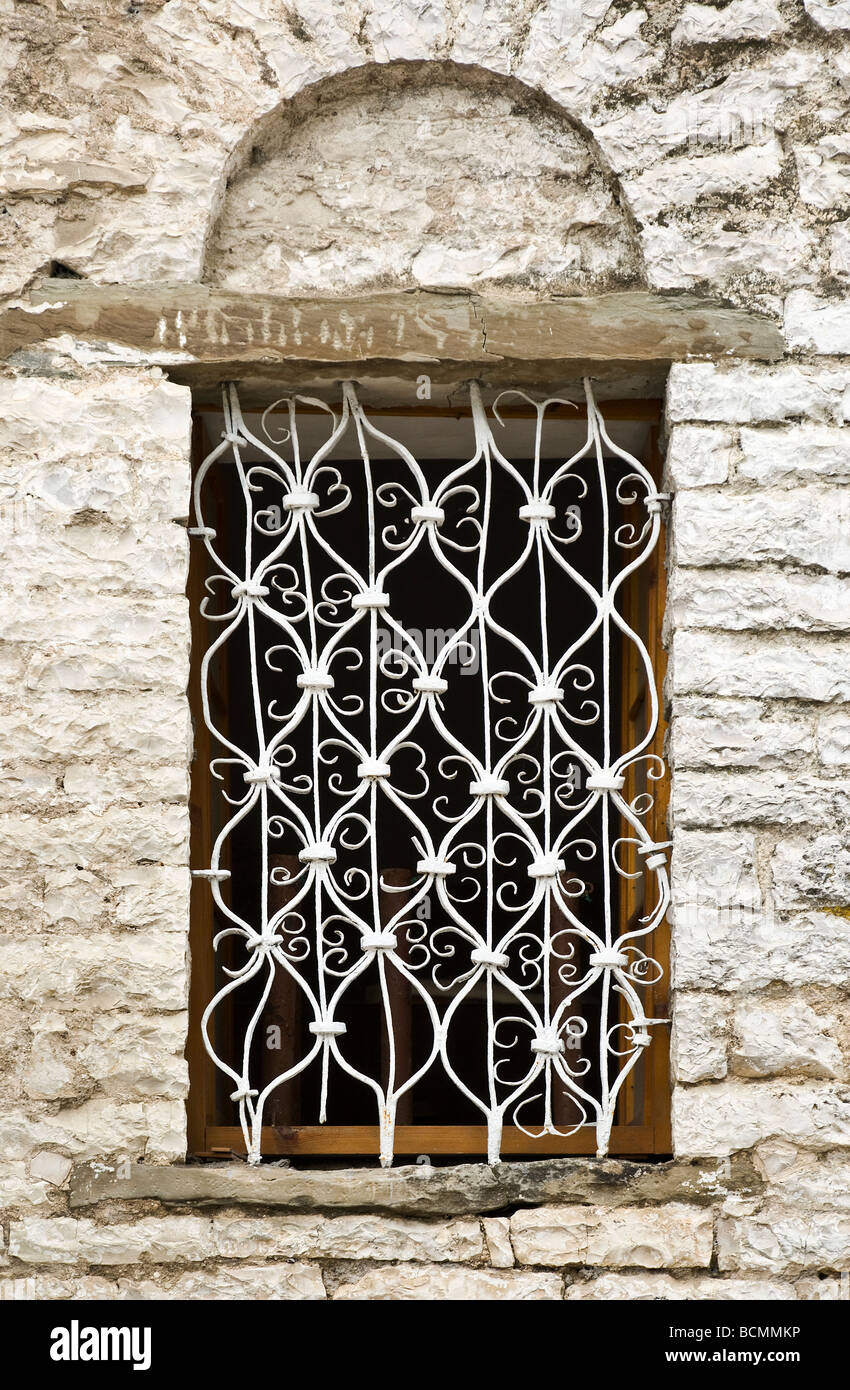 A wrought iron window grill in the mosque in the Pazari i vejeter district of old Gjirokastra in southern Albania Stock Photo