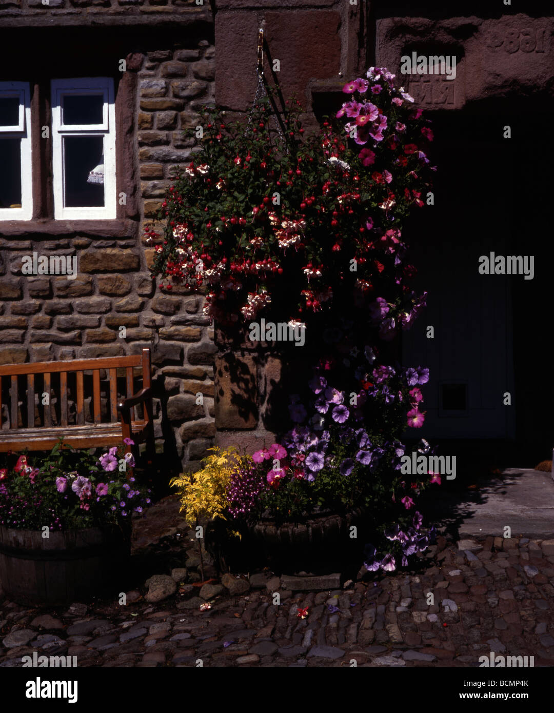 Hanging flower baskets and tubs Chipping Lancashire England Stock Photo