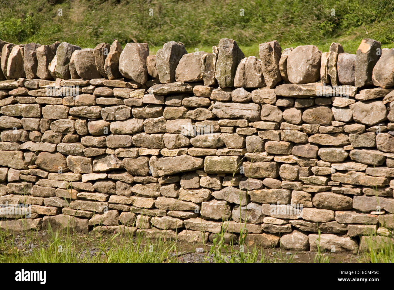 A dry stone wall in Teesdale, northern England. Dry stone walls are an environmentally friendly means of marking pastoral land. Stock Photo