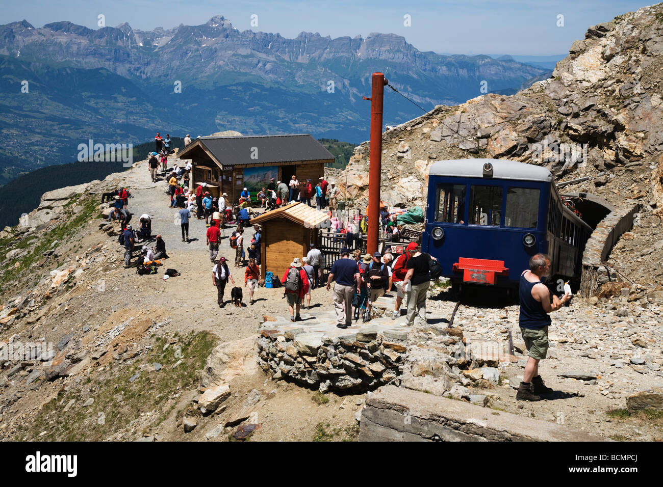 Mont Blanc Tramway at Nid d'Aigle Station (2380 M) with passengers of tourists and mountaineers Stock Photo