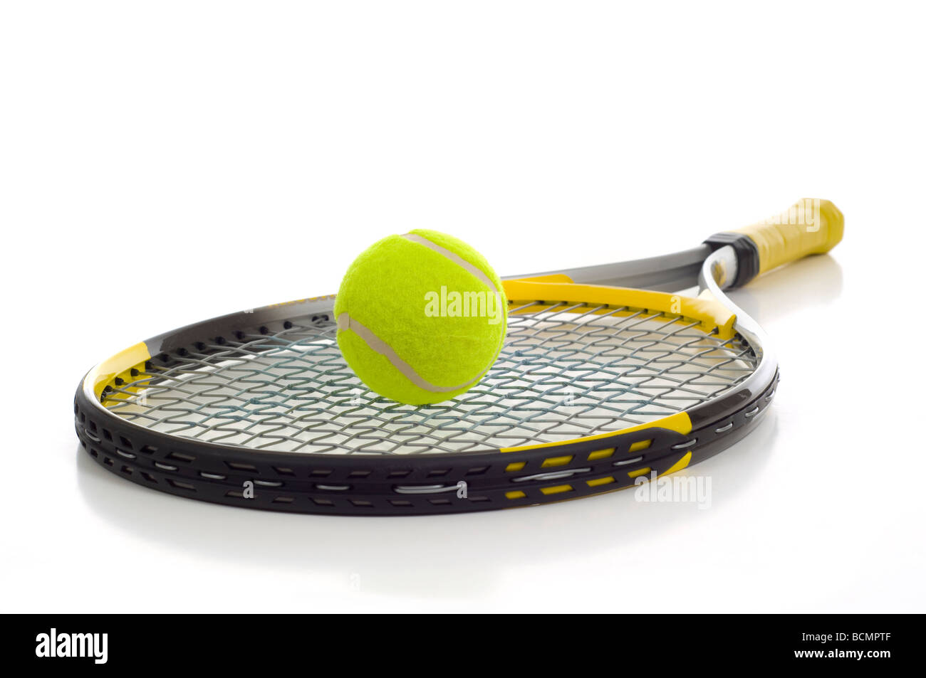 Tennis ball and racket on white background with copy space Stock Photo