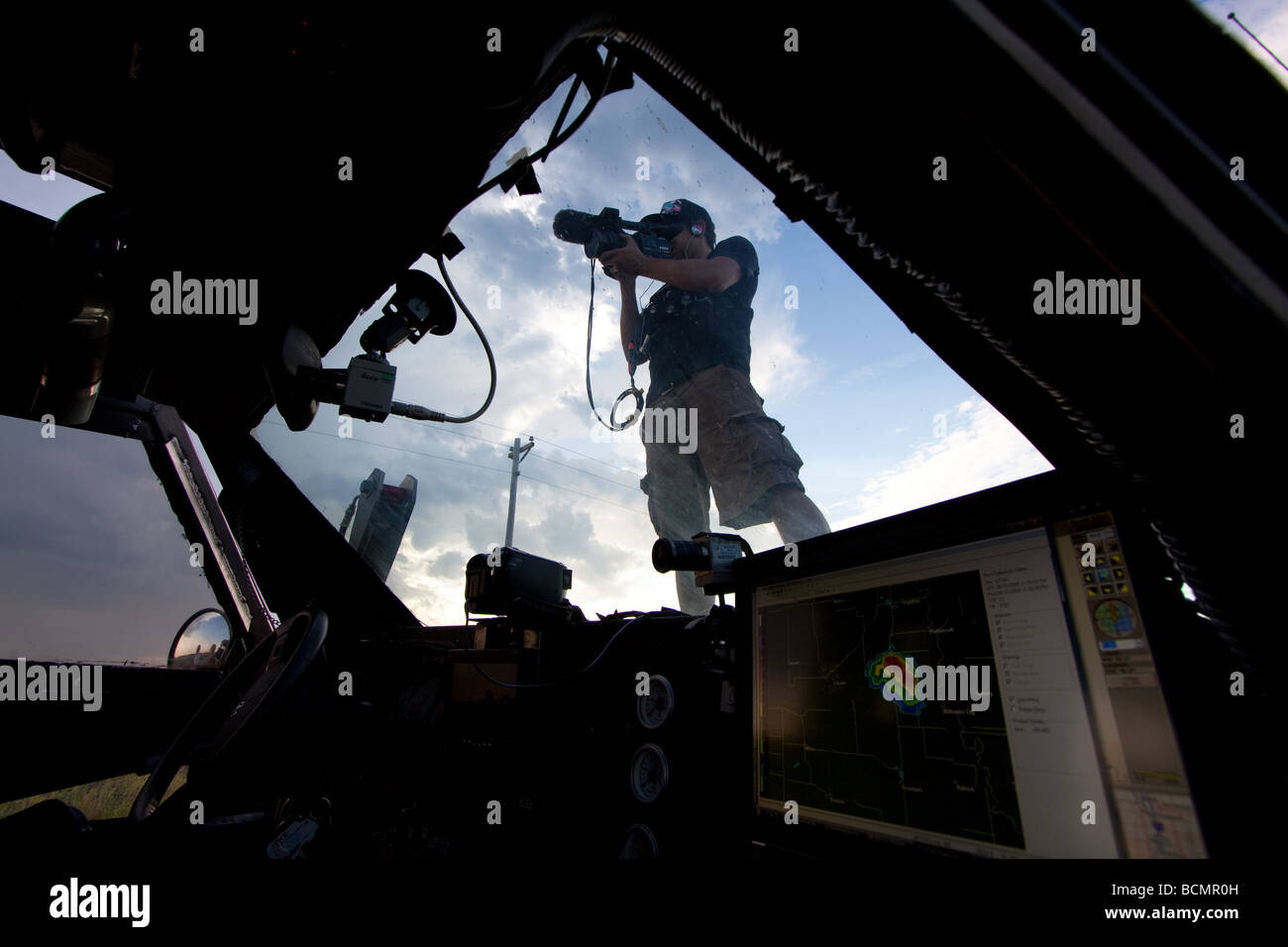 Storm Chaser and IMAX videographer Sean Casey sits on TIV during Project  Vortex 2 as the Discovery Channel crew films him Stock Photo - Alamy