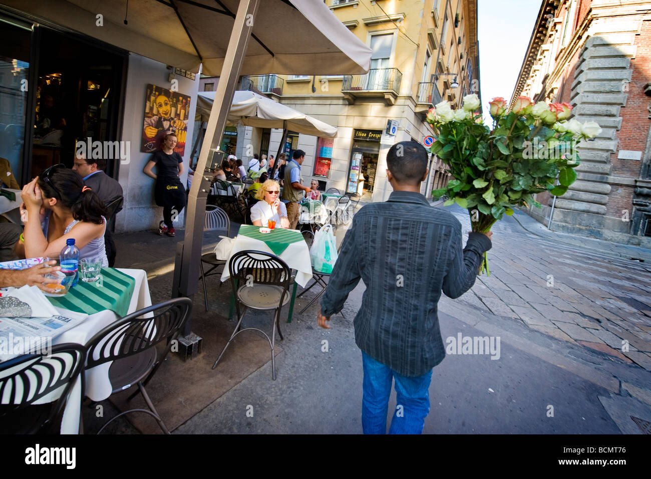 milan brera immigrant seller of roses Stock Photo