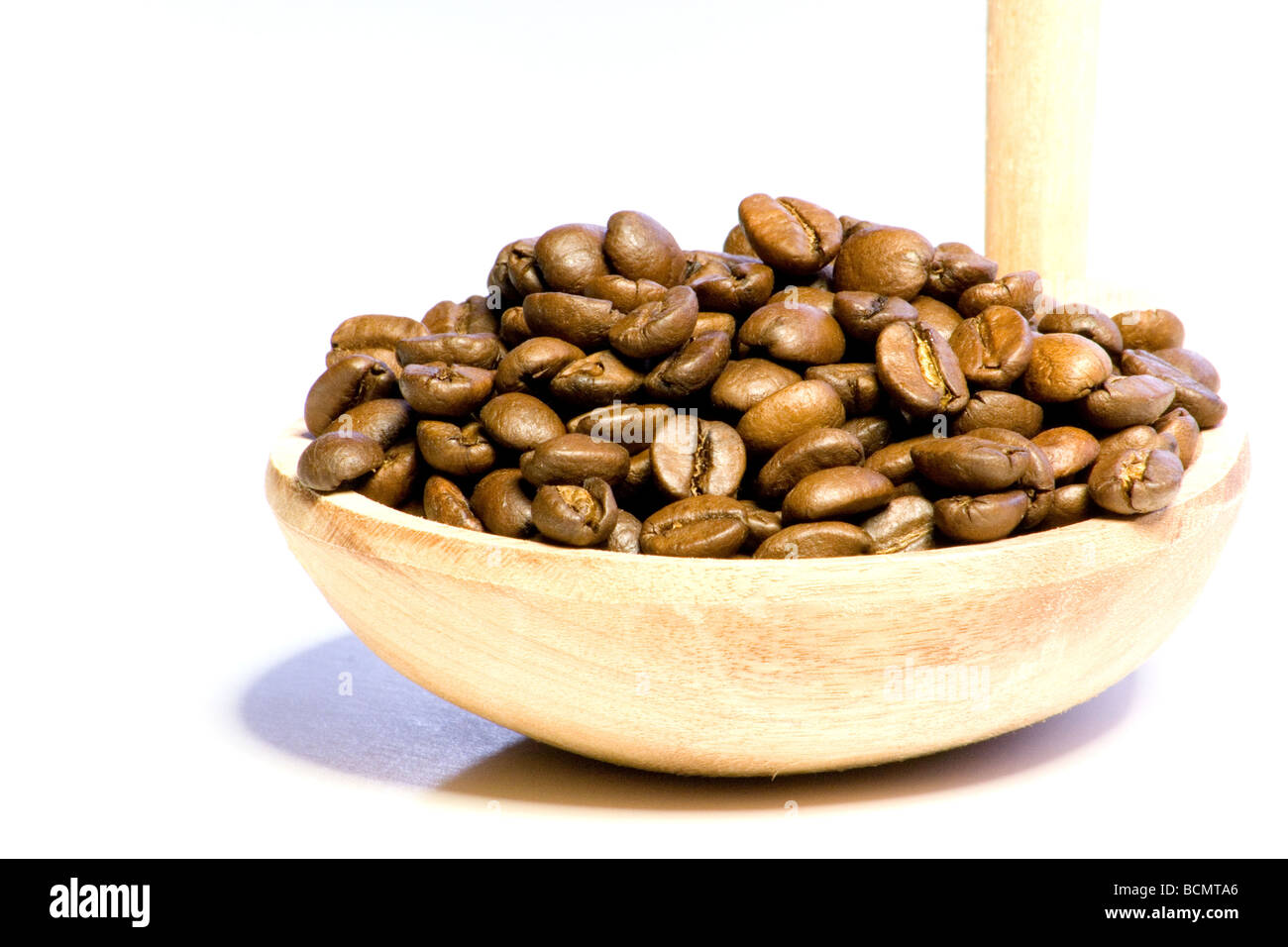 Scoop of coffee beans closeup Stock Photo Alamy