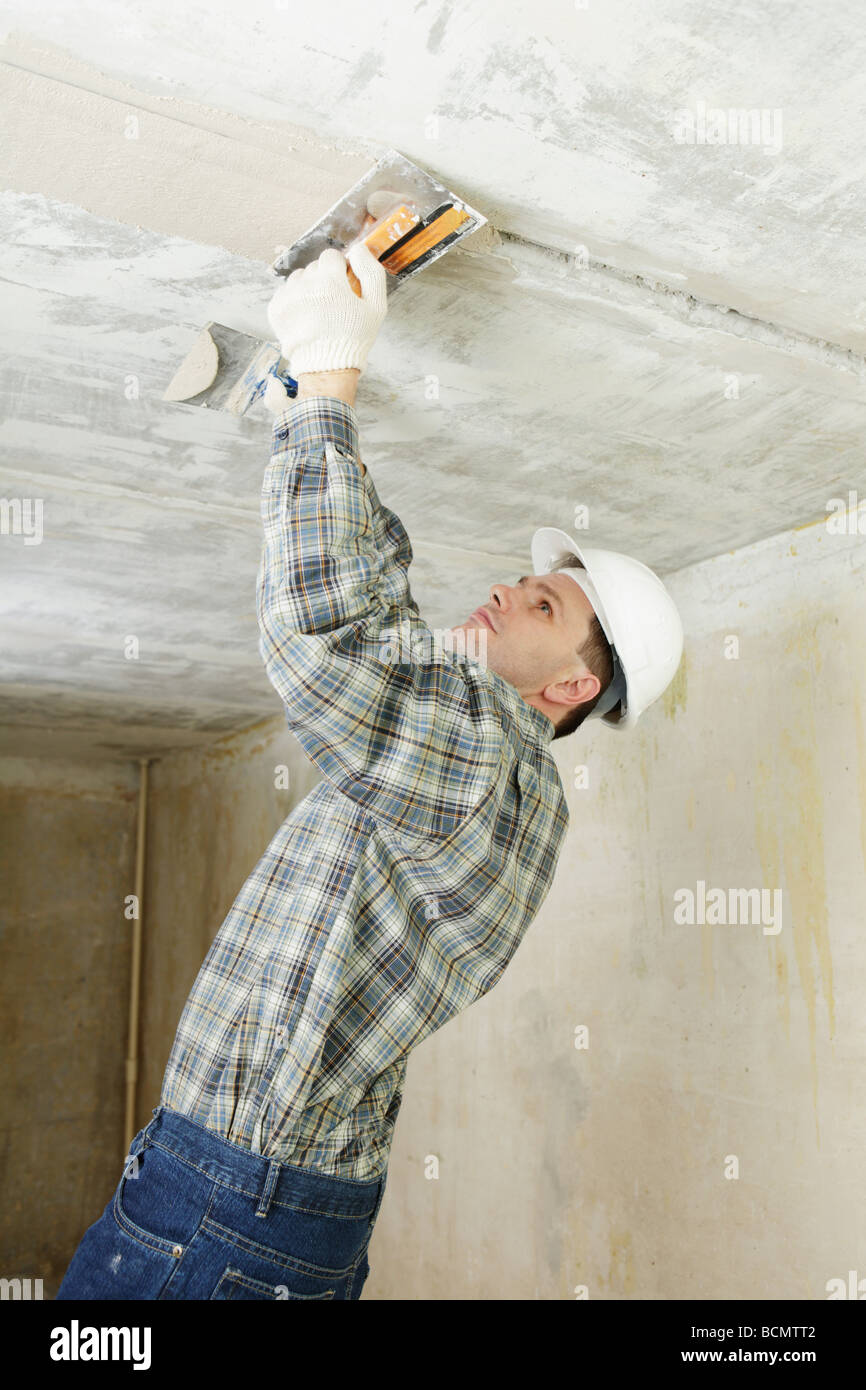 Man In White Hardhat Pargets The Ceiling Stock Photo 25044770 Alamy
