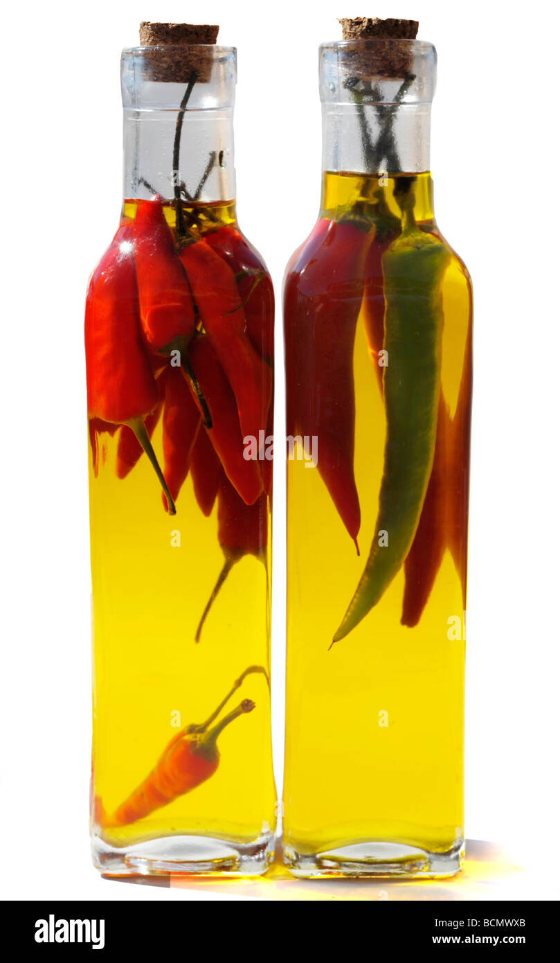 Chili oil, hot chili peppers in olive oil, for spicy dishes Stock Photo -  Alamy