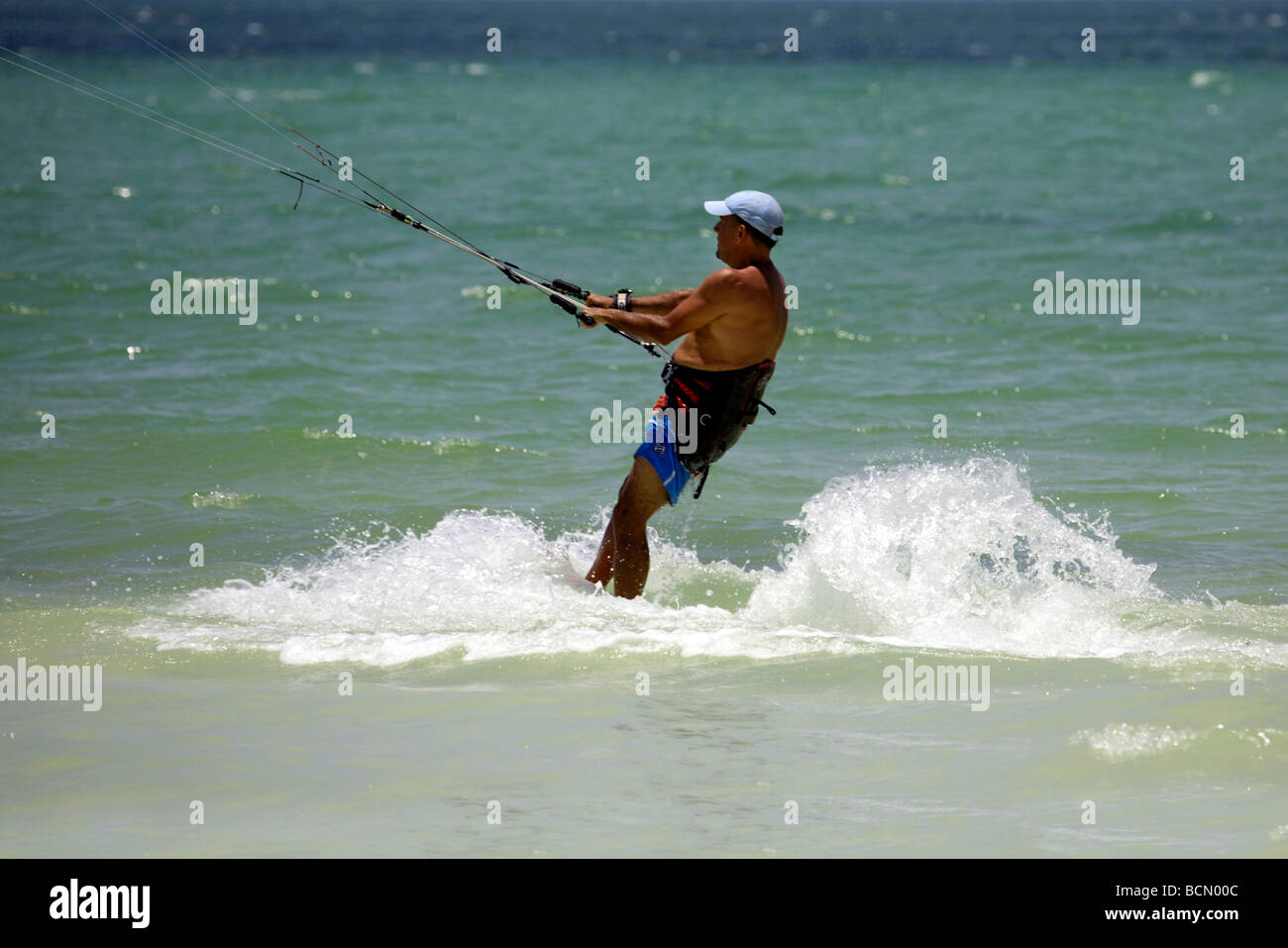 Man kite surfing on Holbox island, Quintana Roo, Yucatán Peninsula, Mexico, a unique Mexican destination in the Yucatan Channel, Stock Photo