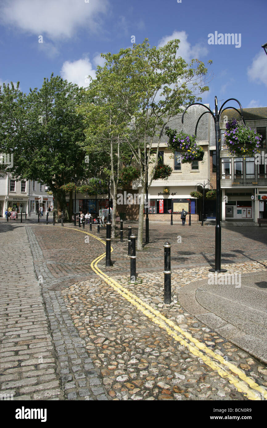 City of Truro, England. Sunny Sunday morning view of a shoppers transiting through Truro’s Pydar Street, viewed from High Cross. Stock Photo