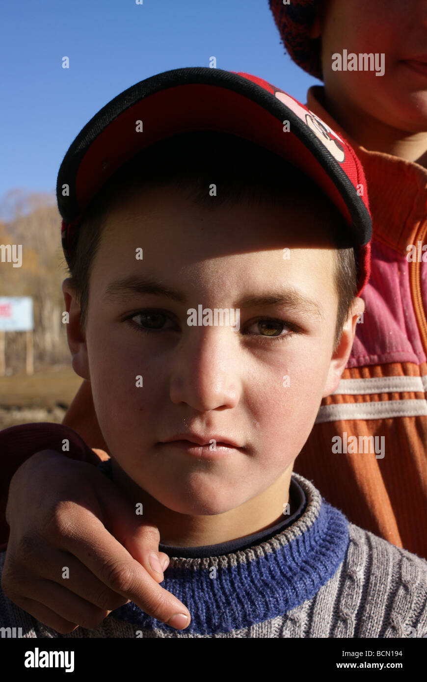 Portrait of a Uyghur boy, Tashkurgan Tajik Autonomous County , Kashgar Prefecture, Xinjiang Uyghur Autonomous Region, China Stock Photo