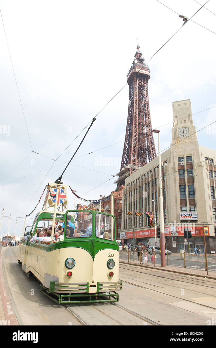 Open top heritage tram number 600 in front of Blackpool tower in summer Stock Photo