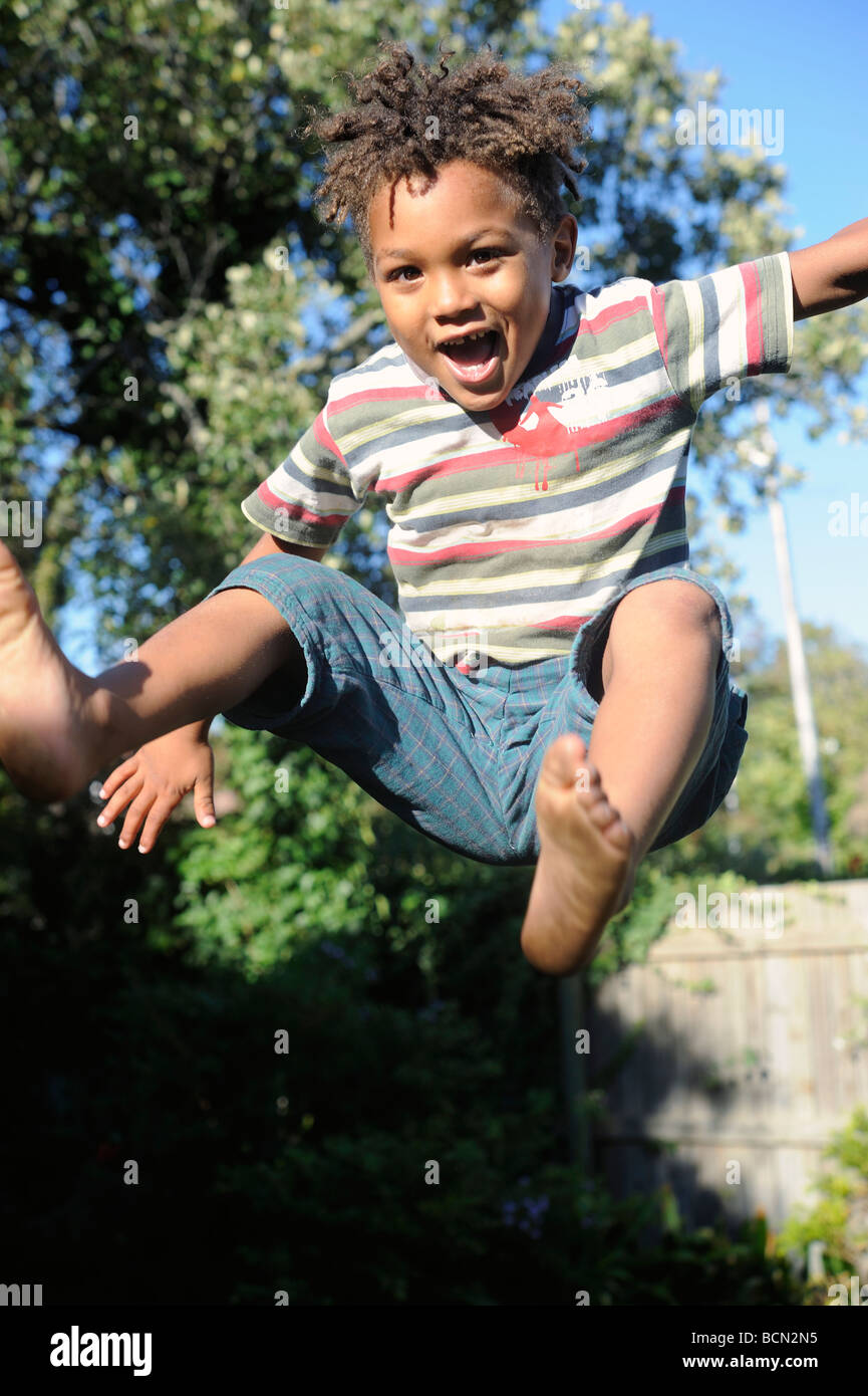 Young boy jumping Stock Photo