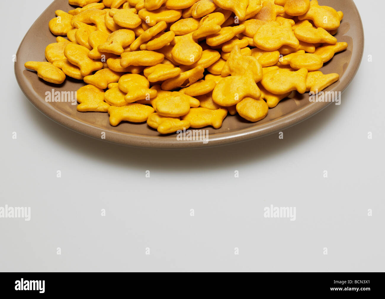 Bowl of Salty Goldfish Crackers Stock Photo