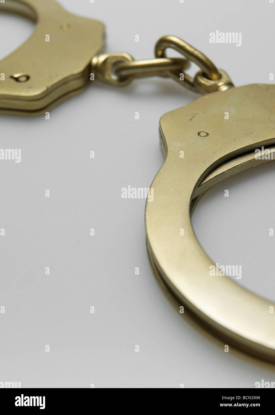 Golden Handcuffs Stock Photo Alamy