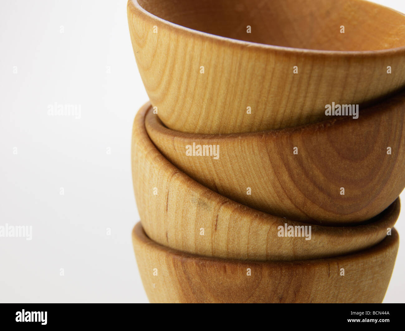 Stack of Four Wooden Bowls Stock Photo