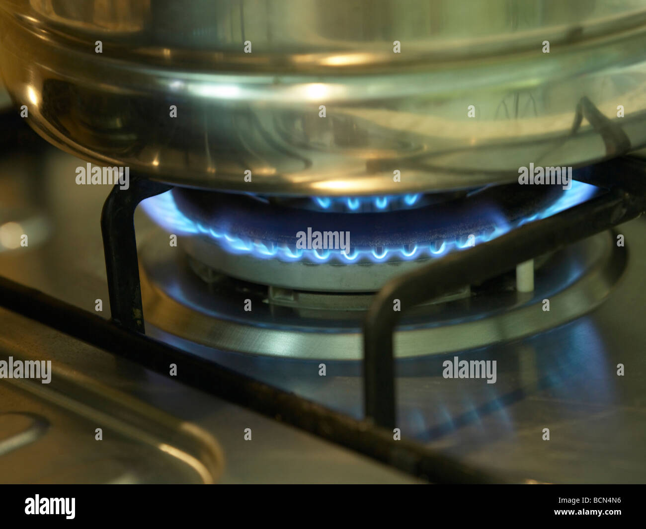 a steamer on a lit stove Stock Photo Alamy