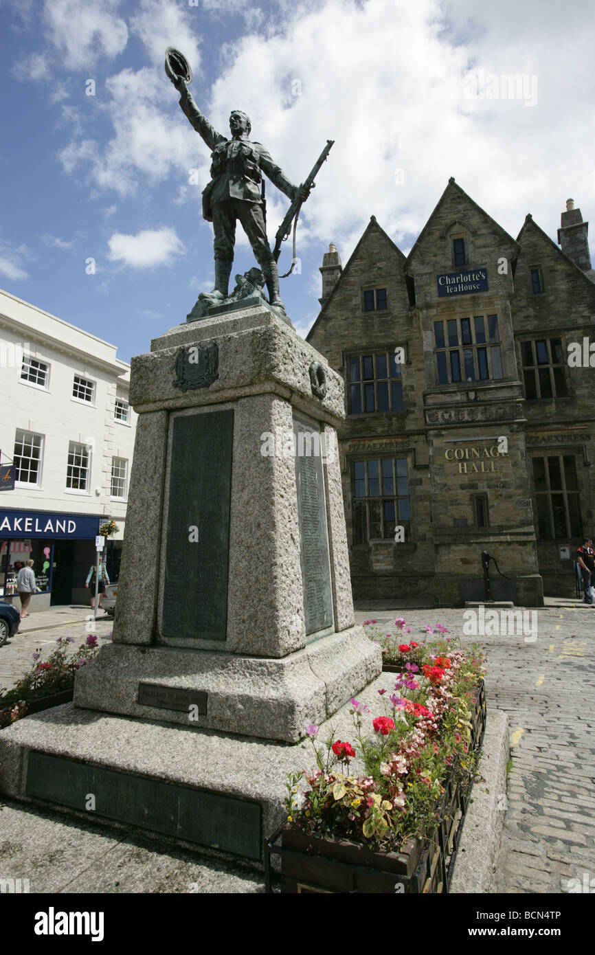 City of Truro, England. Bronze war memorial on marble plinth in Boscawen Street, with Coinage Hall in the background. Stock Photo
