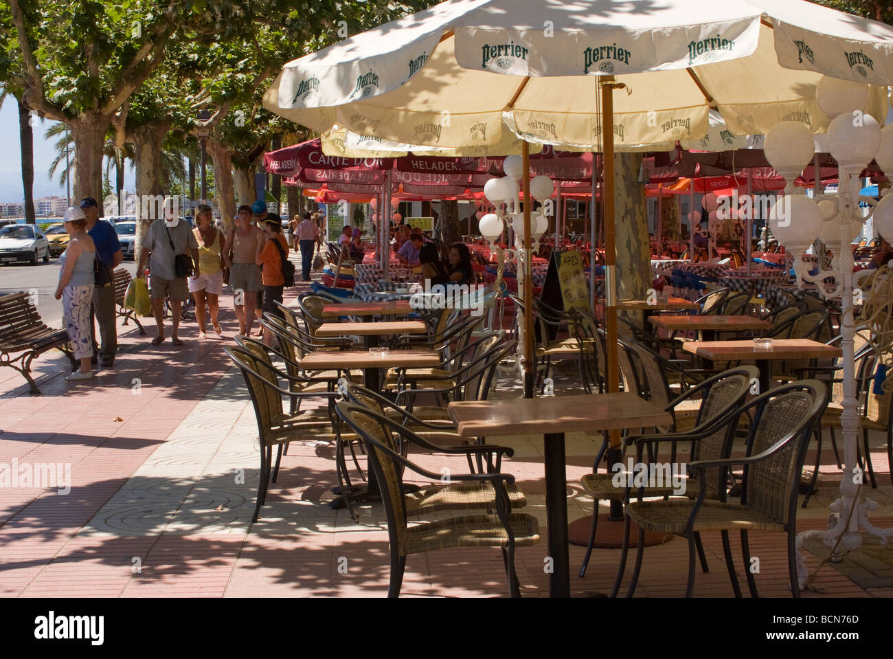 Tables and Umbrellas at Tapas restaurants and Bars at Roses Costa Brava