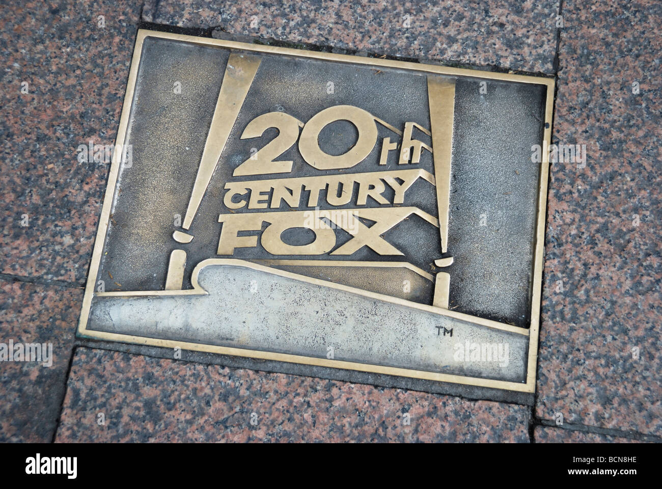 20th Century Fox film company logo on pavement in Leicester Square London Stock Photo