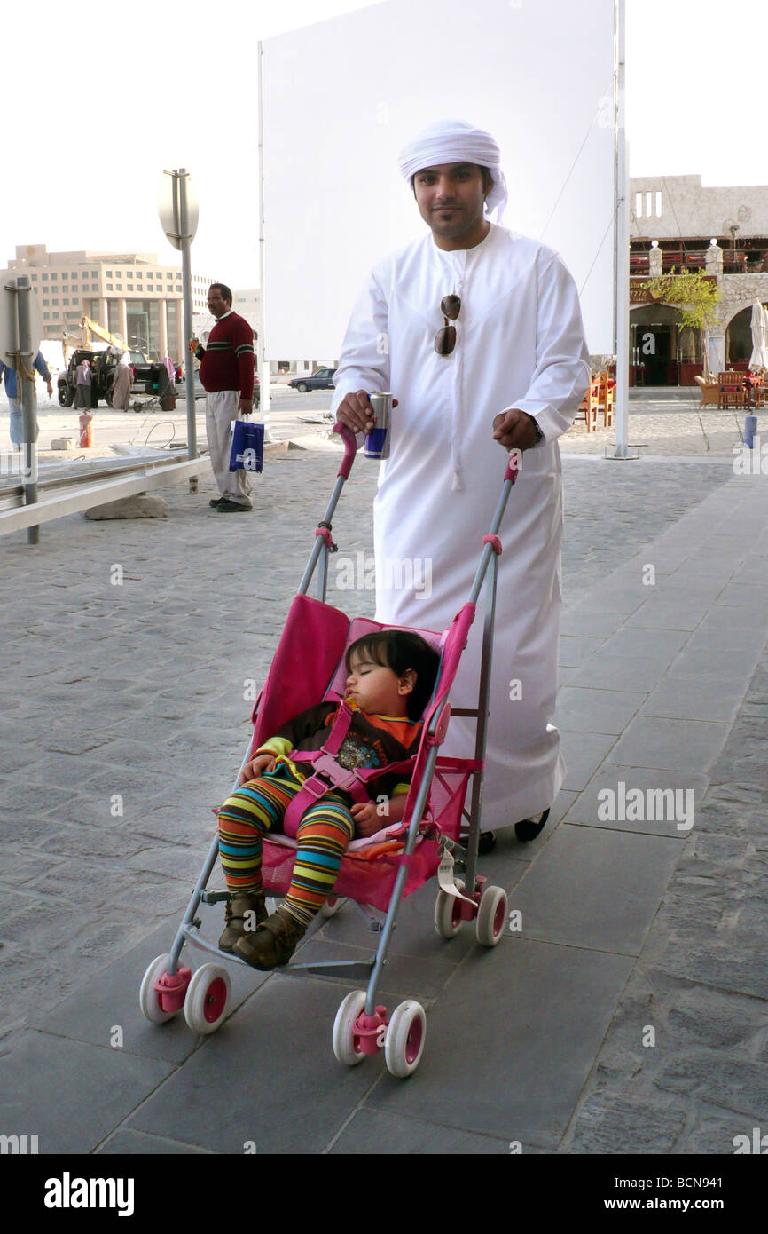 qatar doha daily life father with son Stock Photo Alamy