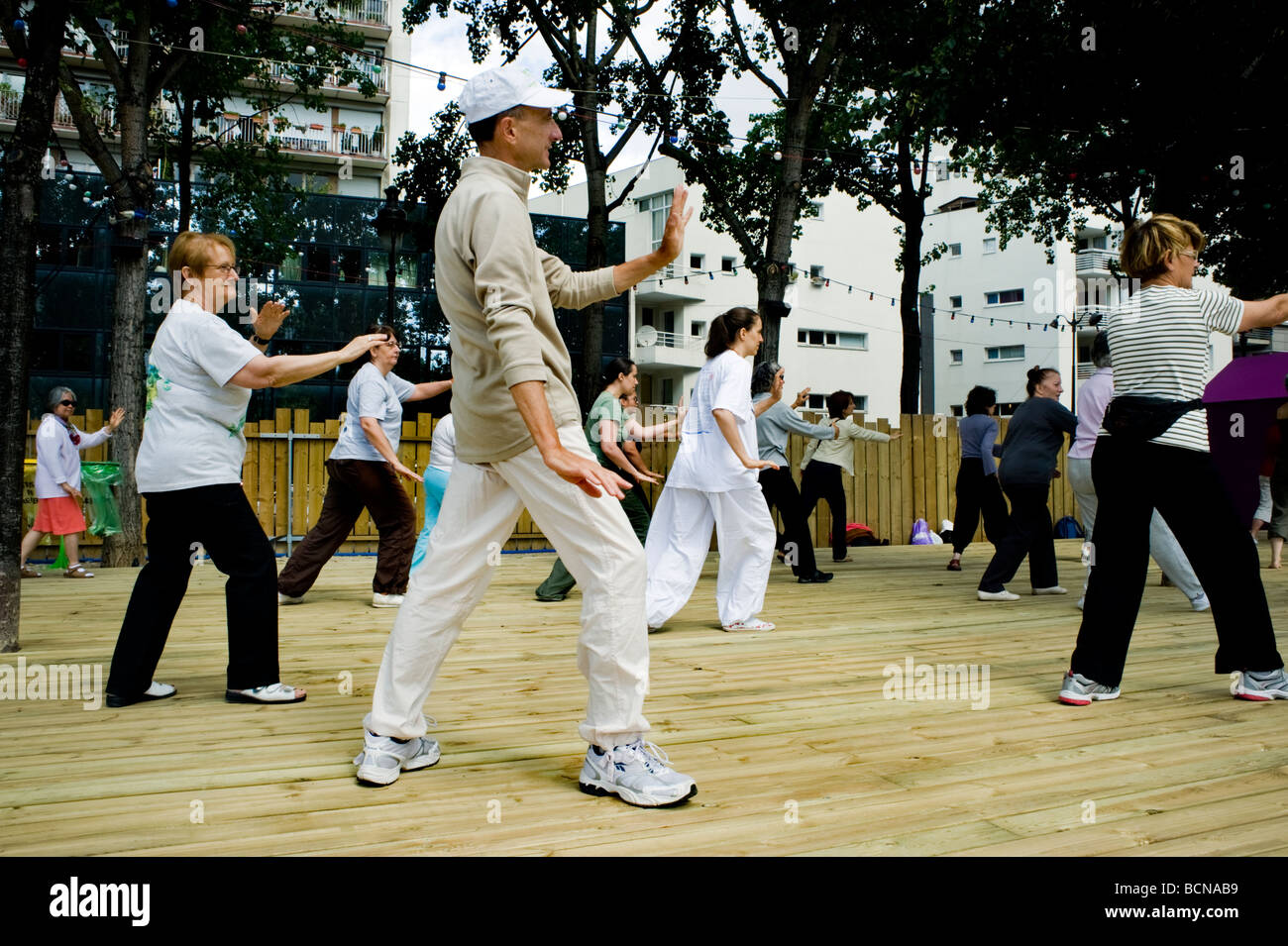 Paris, France, senior people activities, Adults Practicing Exercise 'Tai Chi' at Paris Plages Public Event, Summer Festival Stock Photo