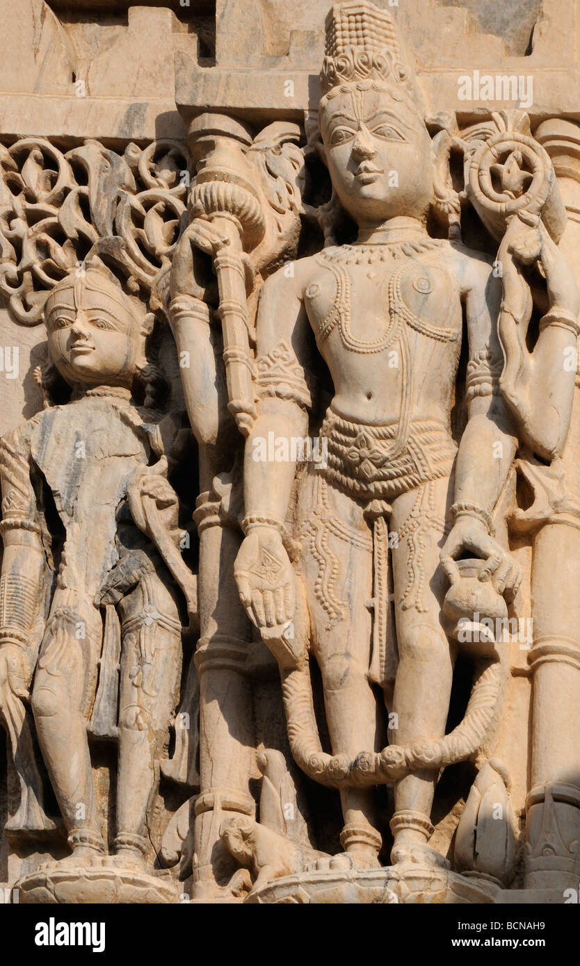 Intricate stone carvings on temple walls. Jagdish Mandir temple. Udaipur, Stock Photo