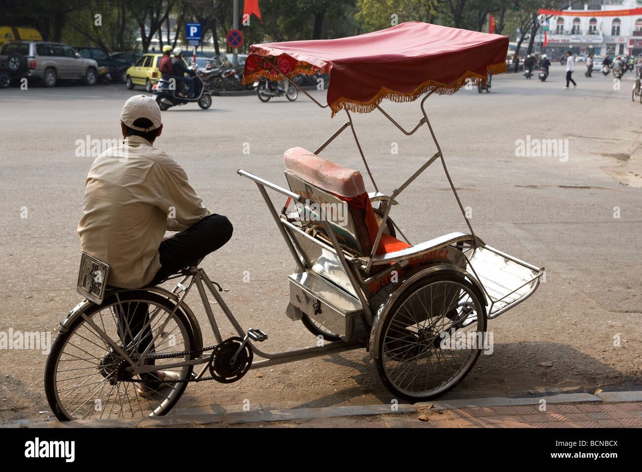 Cyclo Rider waiting for fares Phnom Penh Cambodia Stock Photo