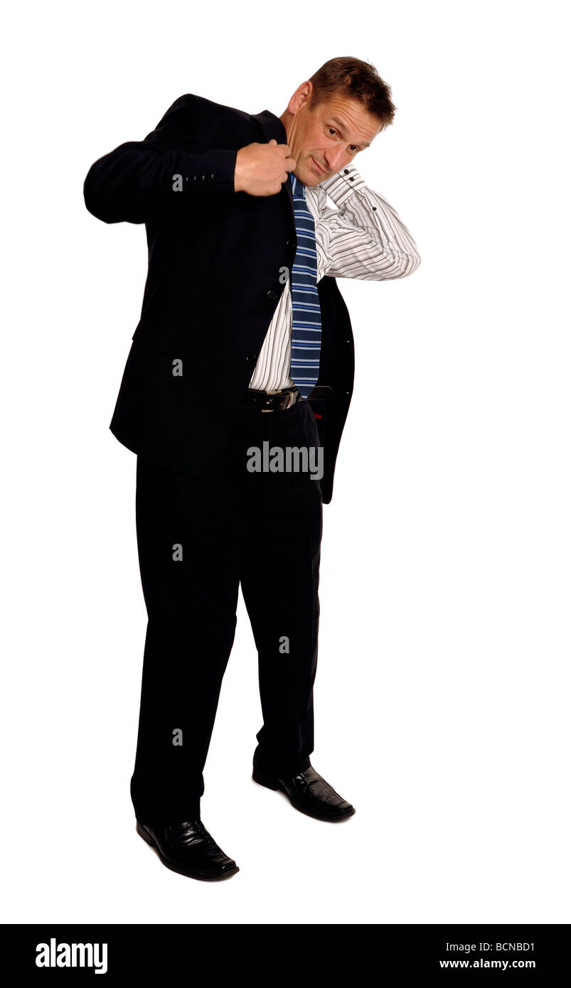 Man putting on a jacket Stock Photo