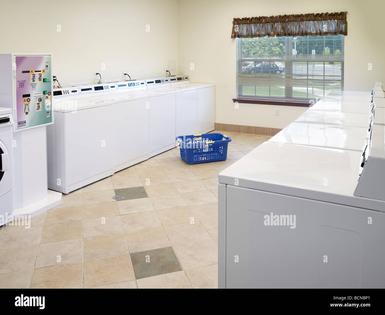 Laundry Basket In Empty Laundromat, USA Stock Photo Alamy