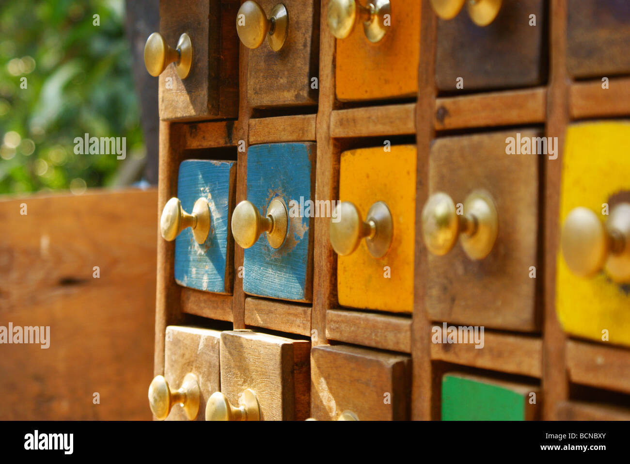 Colored spice cabinet from South East Asia Stock Photo