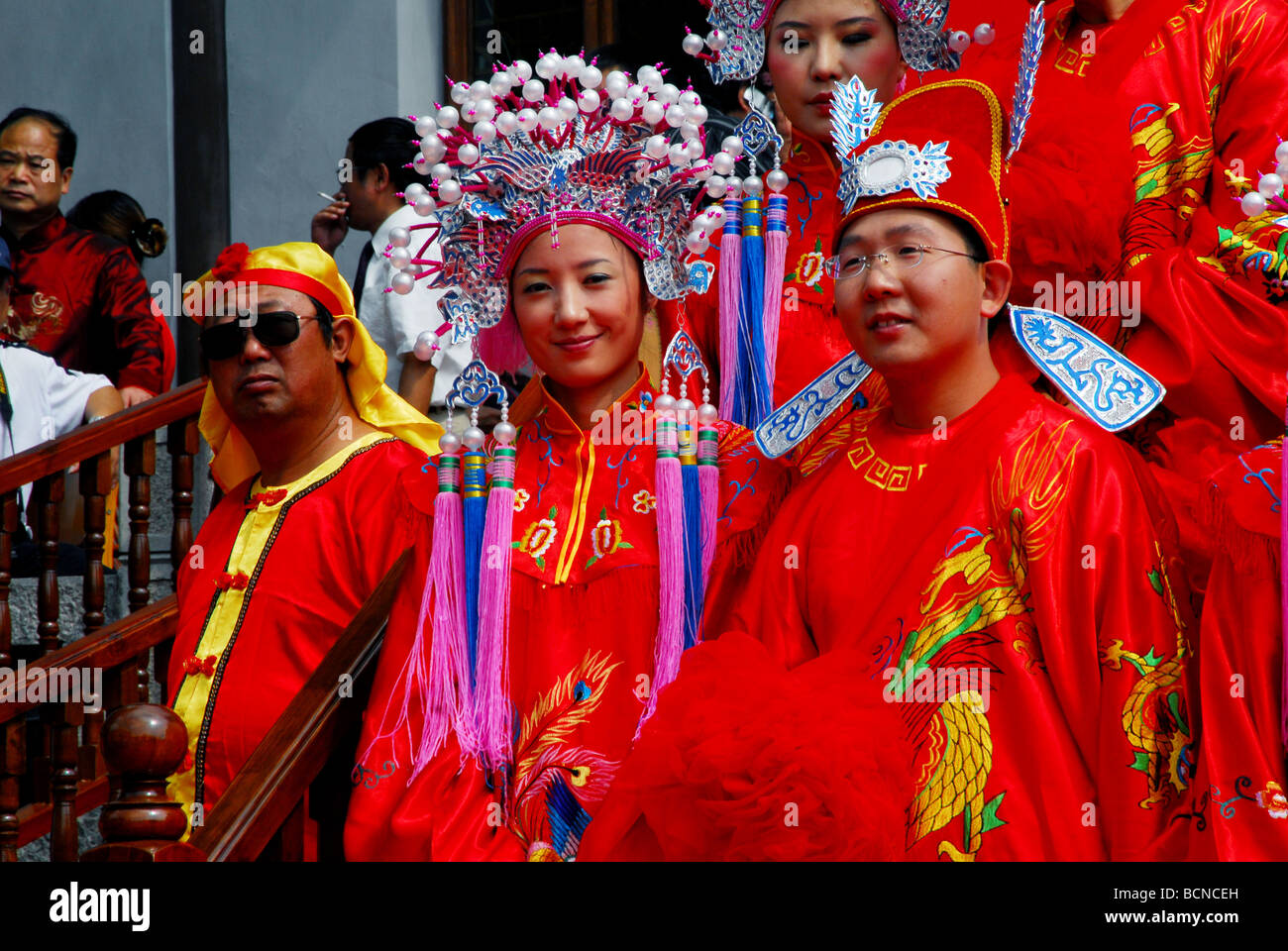 bride-and-groom-wearing-traditional-wedding-dress-in-a-collective