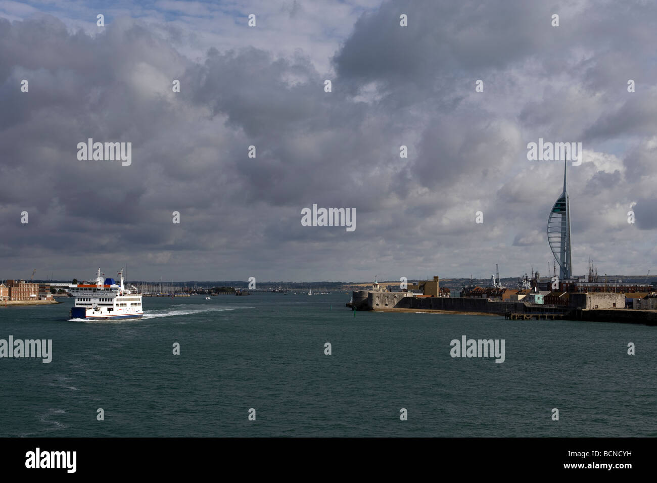The Wightlink Isle of Wight ferry St Helen leaving Portsmouth Harbour with the landmark Spinnaker Tower on the right Stock Photo