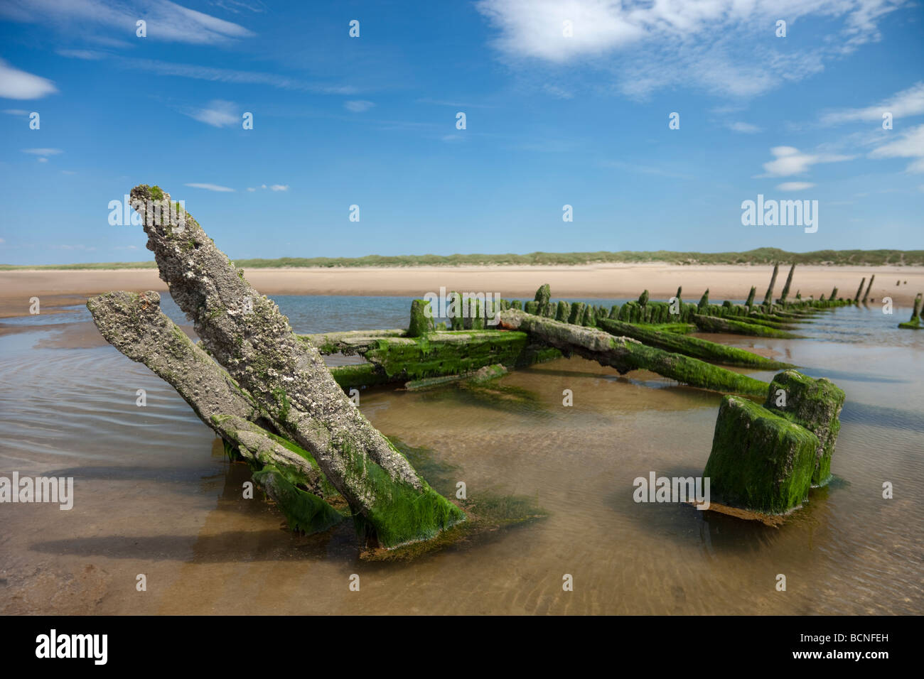 Timber shipwreck on the beach at Ainsdale on Sea, North West England